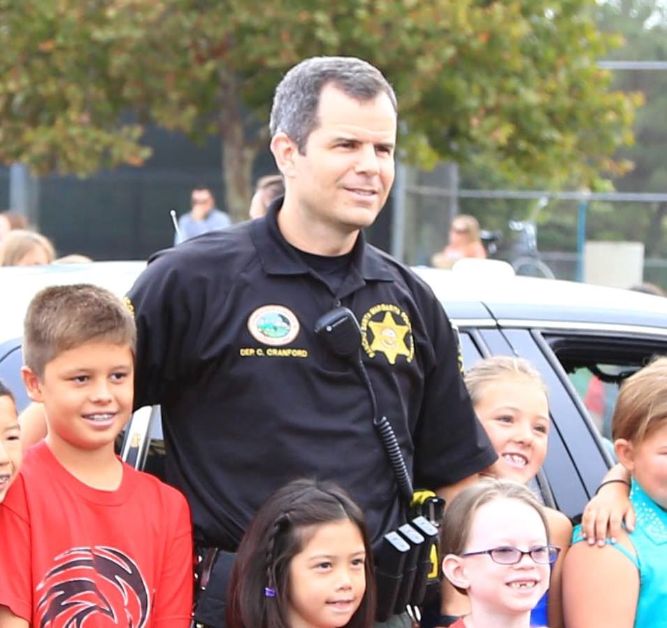 Deputy Clay Cranford with students